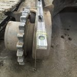 Bent track frame hub carrier